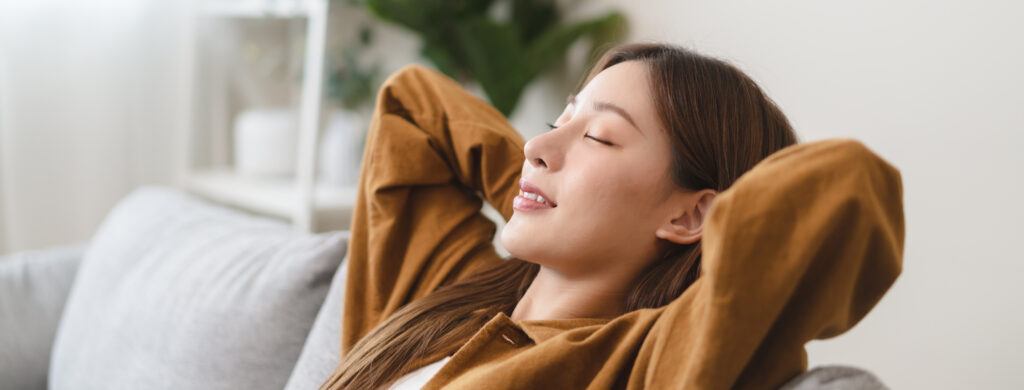 Young woman enjoying a mindful moment relaxed and calm